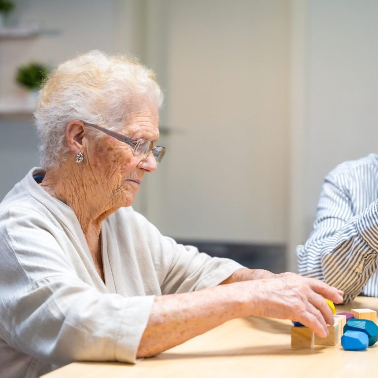 woman-and-man-in-a-nursing-home-playing-skill-game-2026-03-16-02-44-46-utc (1)