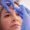 Woman Sitting In Chair Being Give Botox Injection Between Eyes By Female Doctor